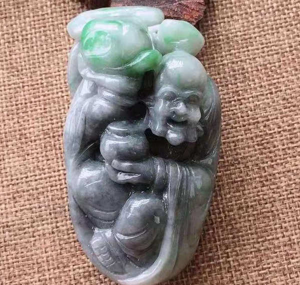 梦见翡翠挂件怎么鉴别一块冰种翡翠原石的真伪   第2张